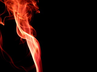 Obraz premium Red smoke on black background