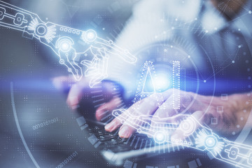 Multi exposure of data internet theme hologram with man working on computer on background. Concept of innovation.