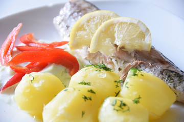 boiled and potato fillet with fish and red peppers