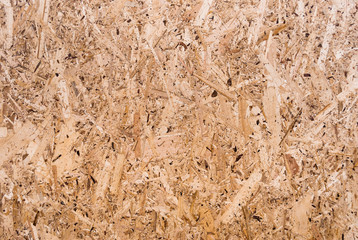 Plywood board texture.  Compressed sawdust panel background. Wood surface for interior design and decoration.