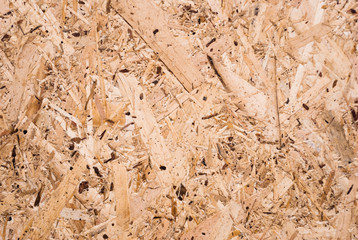Plywood board texture.  Compressed sawdust panel background. Wood surface for interior design and decoration.