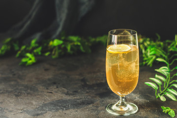 lemonade with lemon and ice (cooling drink). top food background. copy space