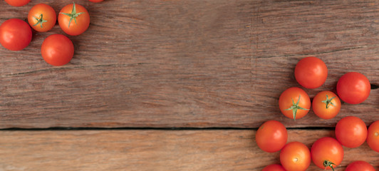 Naklejka na ściany i meble Group tomato place on the wooden table use for background