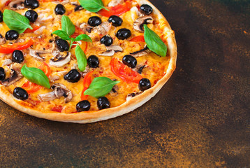 pizza olives, mushrooms, tomato, cheese, basil, sauce and more. top view. food background. copy space for text and lettering