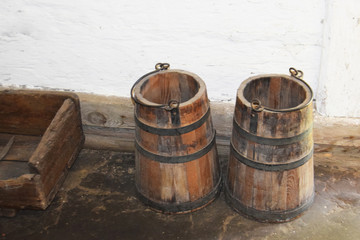 Fototapeta premium wooden buckets and barrels from the Middle Ages for storing and carrying food