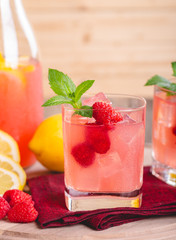 Glass of Raspberry Lemonade With Fresh Berries