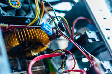 disassembled the case the system unit of a desktop personal computer blades of the cooler wire power supply PC