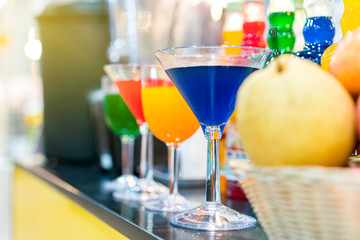 colorful nectar and many in cocktails glass on table