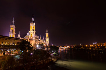 Night view of the Basilica of Our Lady of the Pillar, Zaragoza, Spain.