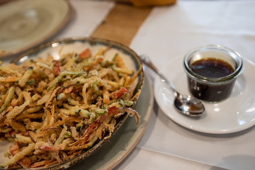 Rich tempura dish with soy sauce with accompanying honey, healthy food and nutritiba.