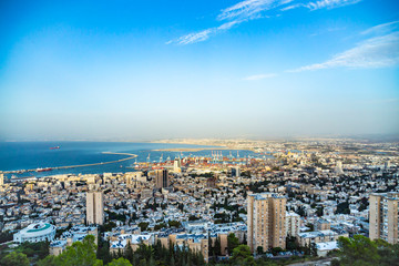 Panoramic view of the harbor port of Haifa, with downtown Haifa, the harbor, the industrial zone in a sunny summer day. Haifa, Northern Israel
