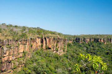 Slope view from the top with extensive sea wall as cut mountain