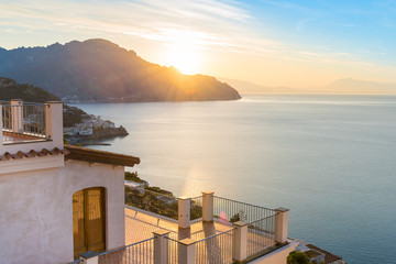 Fototapeta premium Beautiful sunrise over Amalfi town on Italian coast, Italy