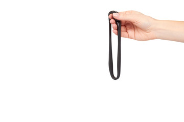 Teenager playing black slime with hand, transparent toy