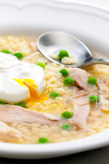 still life of poultry soup with egg