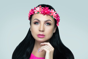 Fototapeta premium Face Fashion model touching her chin, stylish crimson trendy make up