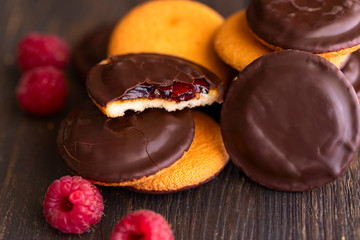 Jaffa cakes, cookies covered with dark chocolate and filled with raspberry marmalade. Sweet...