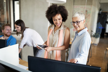 Young african american woman working with tablet in office