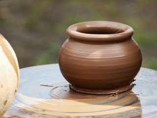 Clay pot on workshop wheel.