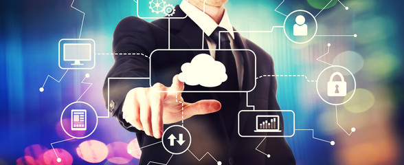 Cloud computing with a businessman on a shiny background