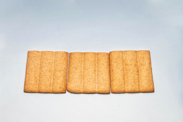 slices of bread un light color blue background 
