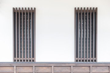 glass window and traditional japan wooden wall of home, texture background.