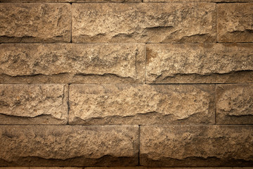 The texture of the retro wall of stone blocks.