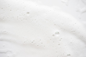 Abstract background white soapy foam texture. Shampoo foam with bubbles - obrazy, fototapety, plakaty