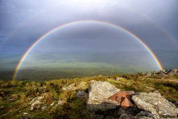 Mountain valley rainbow landscape. Rainbow valley view