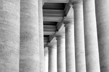 Historic vertical marble columns as stone black and white background
