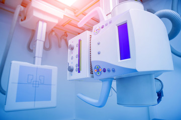 X-ray room in a hospital. Classic ceiling-mounted x-ray system.