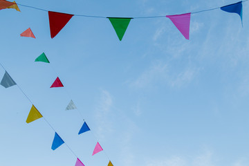 Fototapeta premium festival flag line with blue sky in background