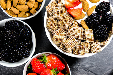 Healthy Breakfast Cereals With Fresh Fruit and Yogurt