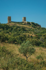 Hilly landscape with the towers of castle