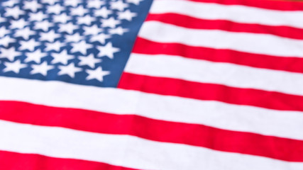 Obraz premium American flag. Close up. American flag blurred background. Concept of patriotism.
