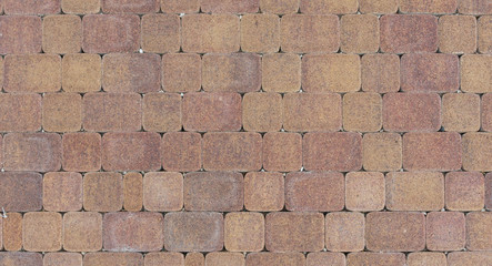 Cobbled surface with paving stones top view Natural stone pavement.