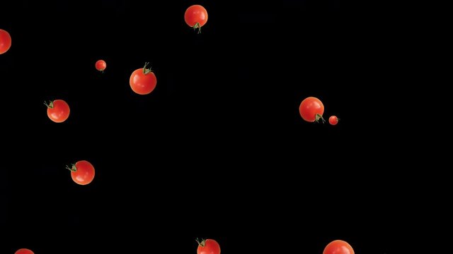 Cherry tomatoes falling on black background. Health concept