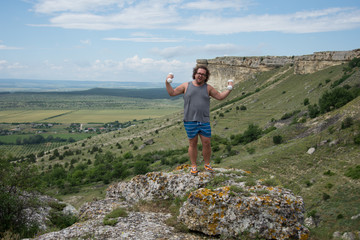 Naklejka premium Funny fat man and fitness. Training with dumbbells.