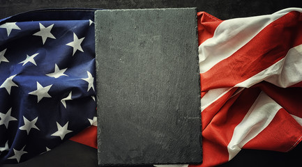 American flag on a black background. Space for text.