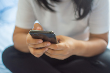 woman use smartphone for internet and shopping online. soft focus.