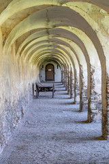 old historic corridor with arches 