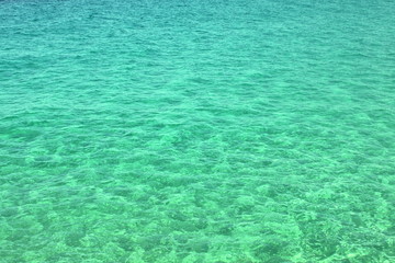 Beautiful natural background with perfectly clear sea water