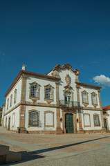 Fototapeta na wymiar Mansion facade in baroque style on a deserted square