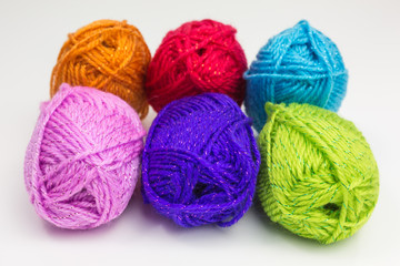 assortment of balls of wool in bright colors