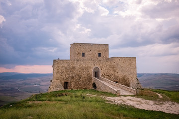 Wonderful view of Monteserico castle on a stormy day. Genzano di Lucania - Basilicata, Italy