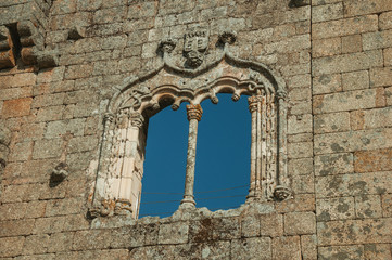 Fototapeta na wymiar Window in gothic style on a stone wall
