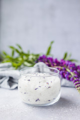 Salt scrub, lavender, Towel on Grey background