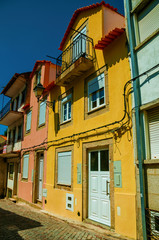 Fototapeta na wymiar Old colorful houses on alley