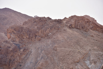CHEBIKA, TN - JULY, 2019: Chebika Oasis lies at the foot of the mountains of the Djebel el Negueb and it is known as Qasr el-Shams (Castle of the Sun in Arabic).