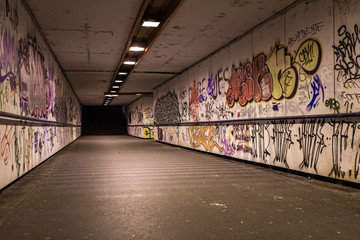 Croatia, Zagreb, June 21, the dark passage of a deserted, eerie creepy concrete indoor pathway...